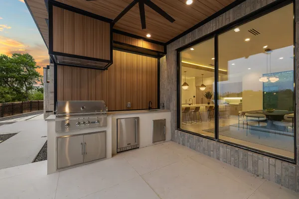 a view of a swimming pool with a yard