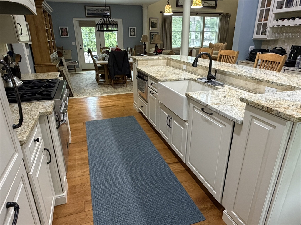 4 Tamarack Lane Sandwich, MA 02563 - Photo 11 of 42 a kitchen with sink refrigerator and window