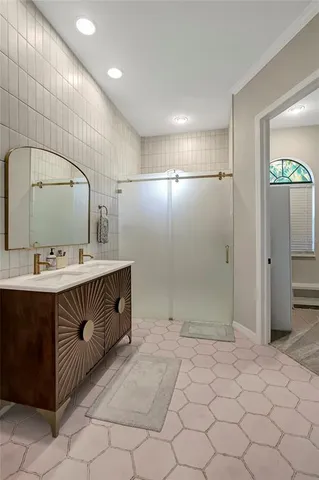 a kitchen with kitchen island granite countertop stainless steel appliances cabinets a sink and a counter top space