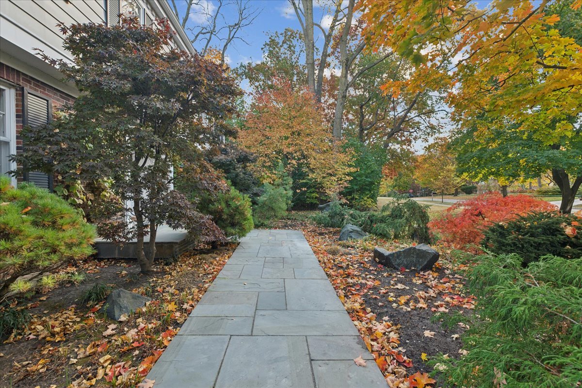 555 Douglas Drive Lake Forest, IL 60045 - Photo 2 of 32 a view of a pathway both side of yard