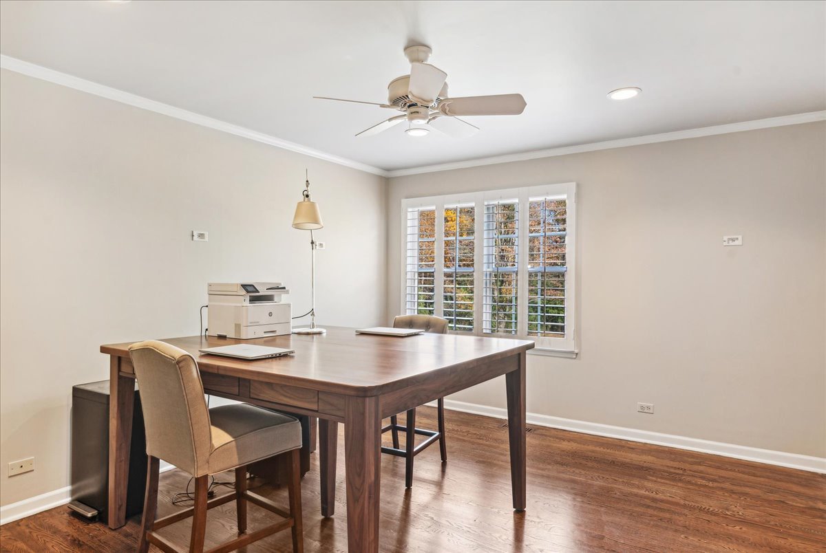 555 Douglas Drive Lake Forest, IL 60045 - Photo 22 of 32 a view of a dining room with furniture window and wooden floor