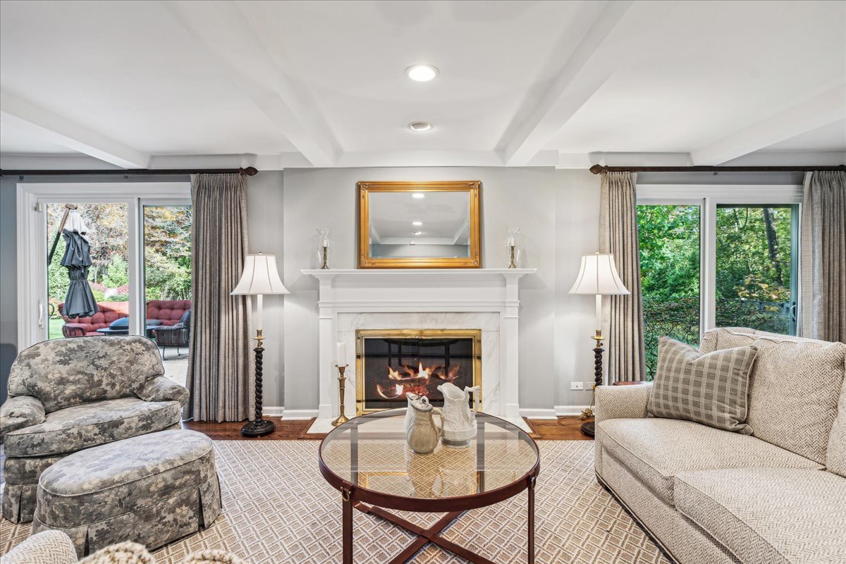 555 Douglas Drive Lake Forest, IL 60045 - Photo 4 of 32 a living room with furniture and a fireplace