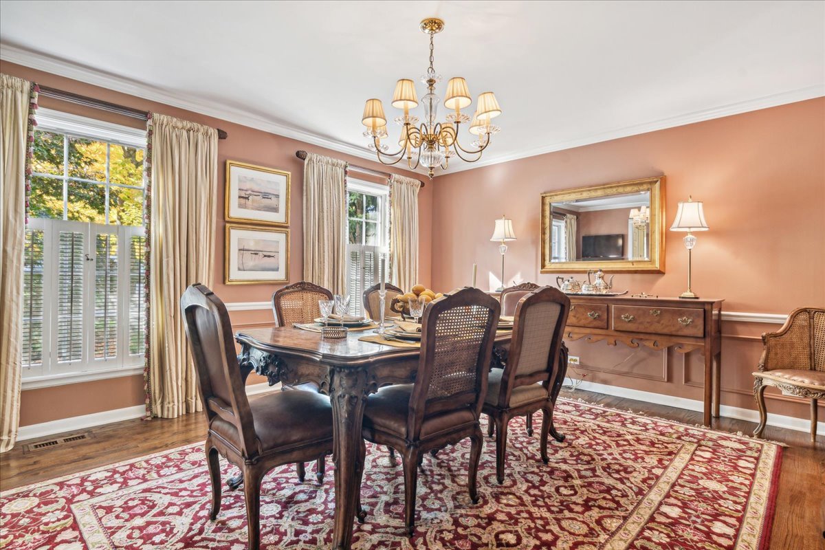 555 Douglas Drive Lake Forest, IL 60045 - Photo 10 of 32 a view of a dining room with furniture window and wooden floor