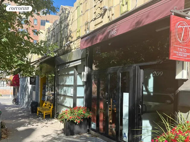 a view of a chairs and table in the patio