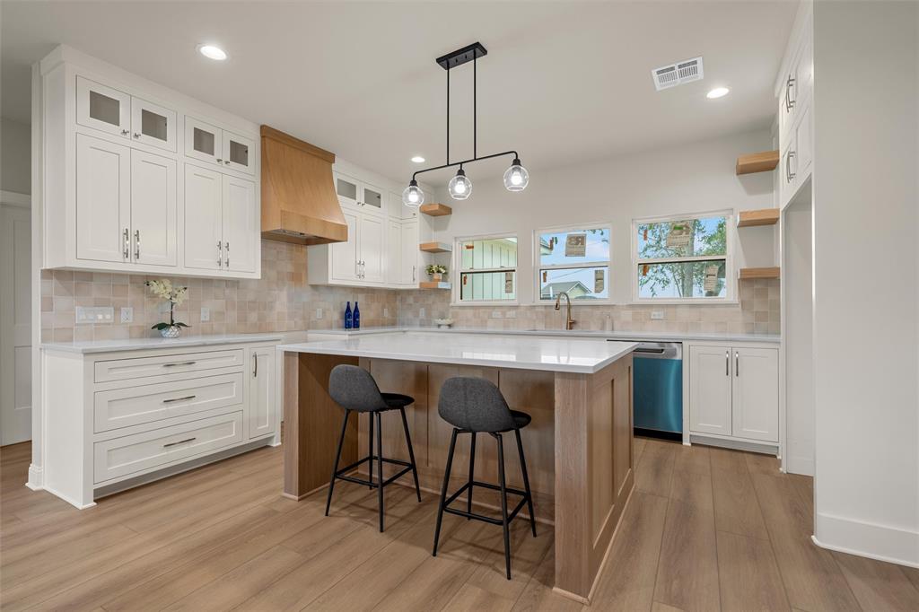 5200 Bogey Lane Waco, TX 76708 - Photo 9 of 37 a kitchen with a sink cabinets and window