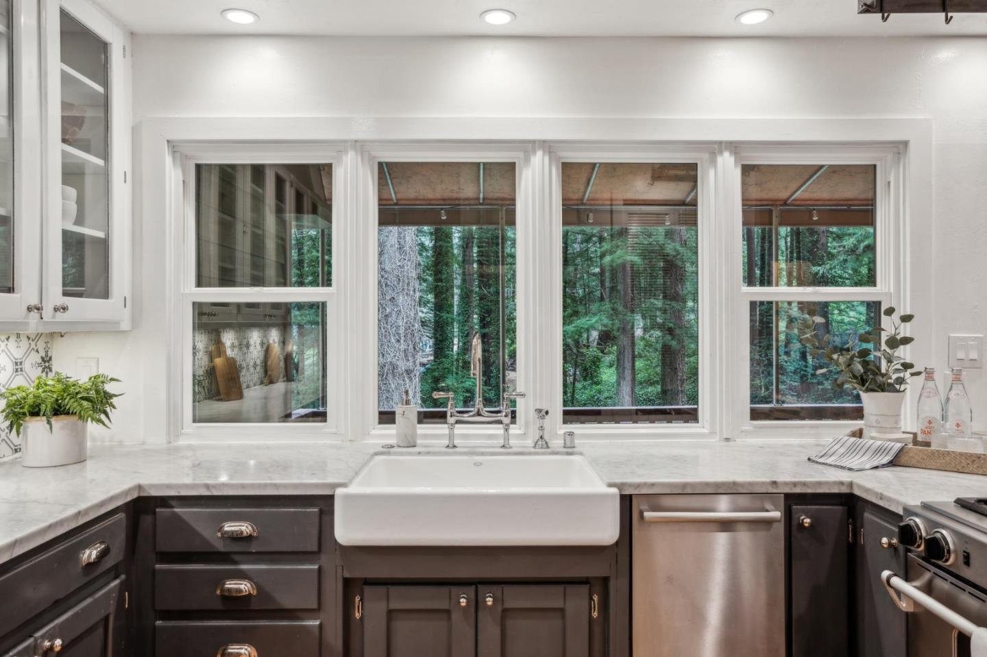 13872 Silver Sky Way Woodside, CA 94062 - Photo 15 of 78 a kitchen with a sink and large window
