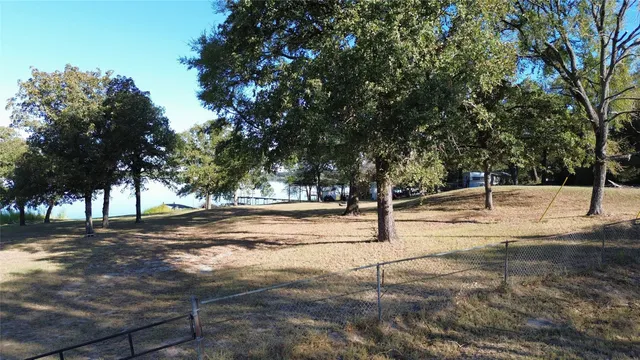 a sign board with yard