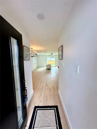 a view of a hallway view with staircase