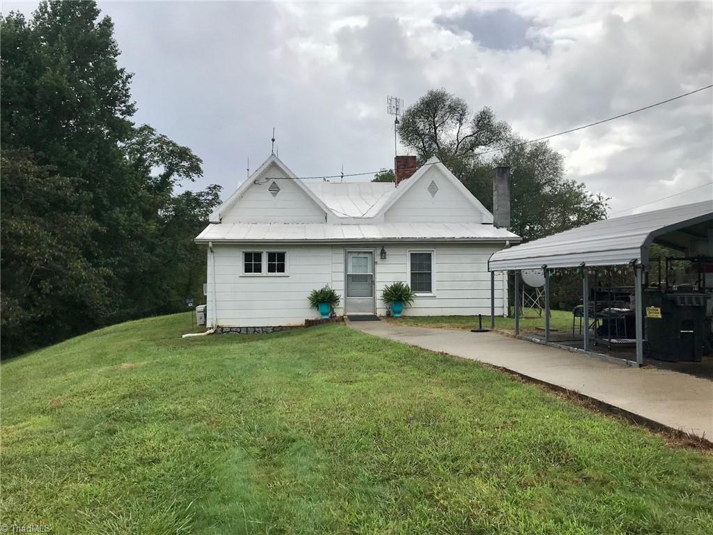 1082 East Carter Mill Road Elkin, NC 28621 - Photo 2 of 21 Front view with Carport