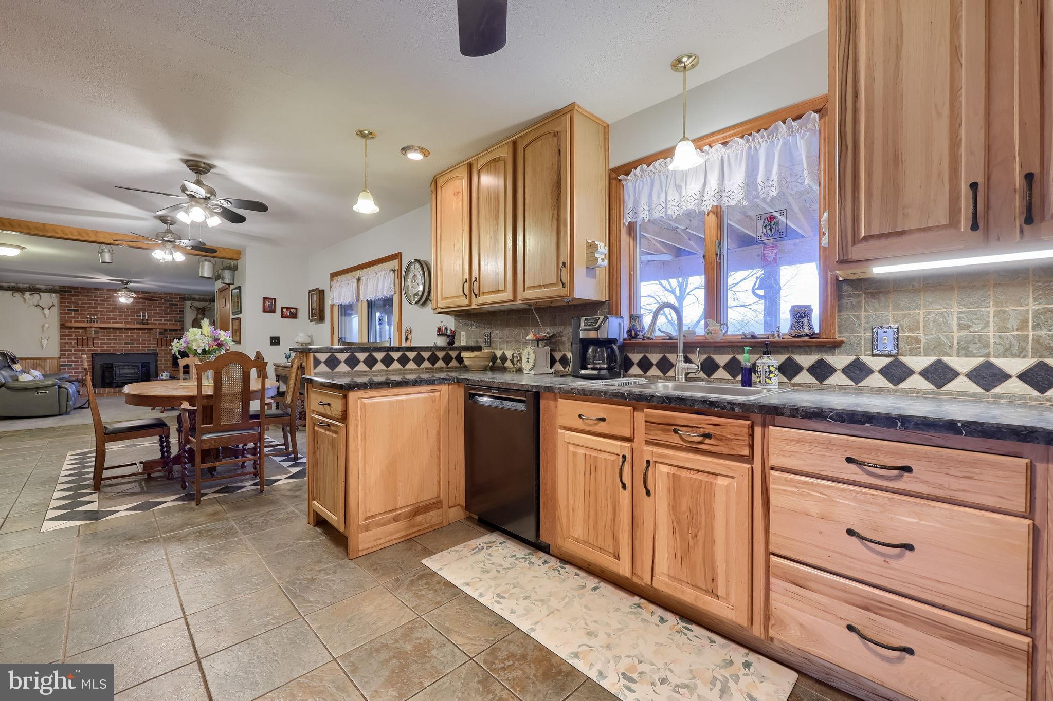 258 Beaver Road Birdsboro, PA 19508 - Photo 16 of 59 Warm and inviting kitchen with rustic charm.