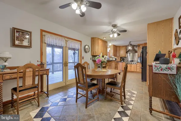 a view of a dining room with furniture