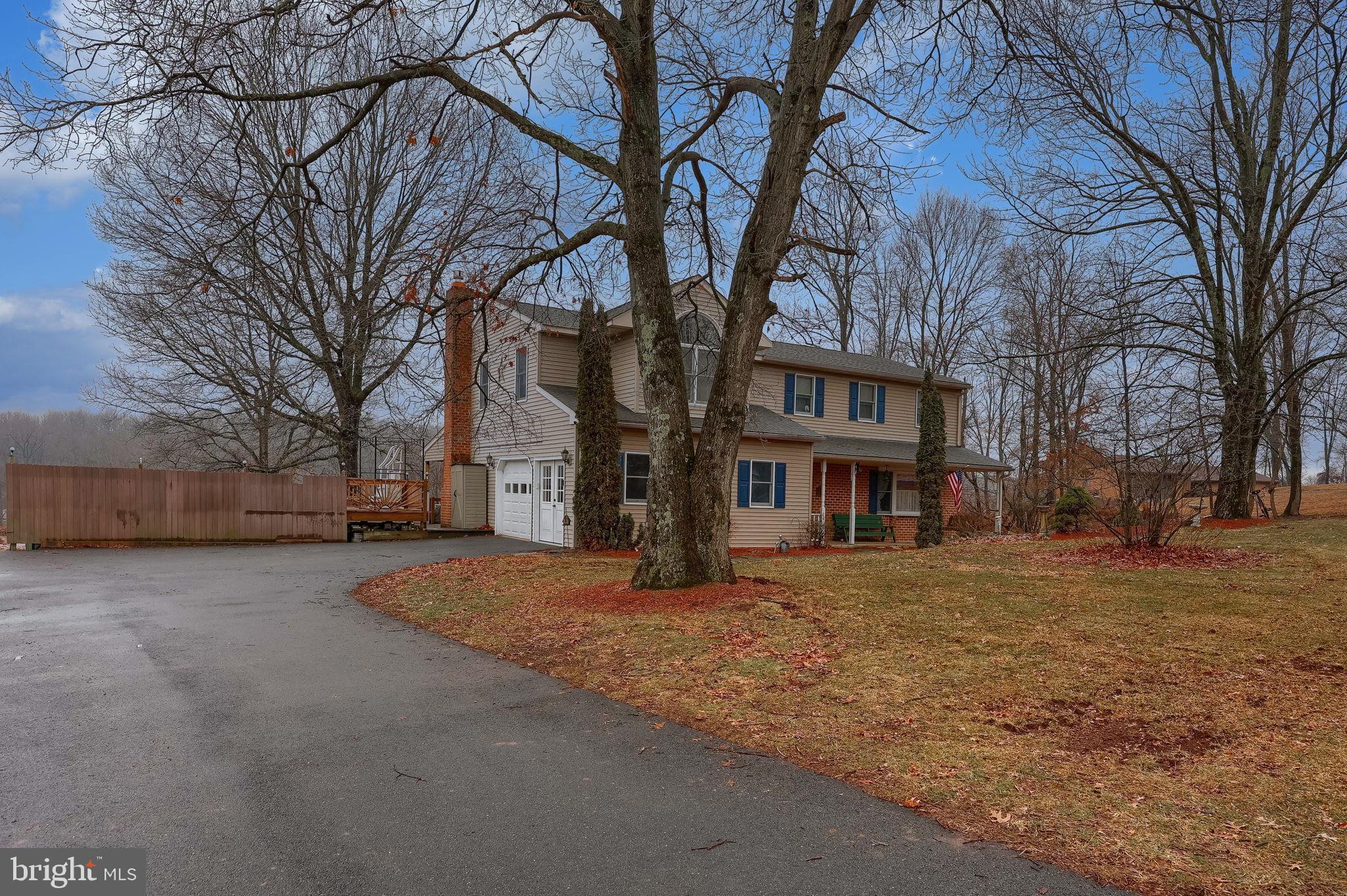 258 Beaver Road Birdsboro, PA 19508 - Photo 2 of 59 Charming home nestled among towering trees.