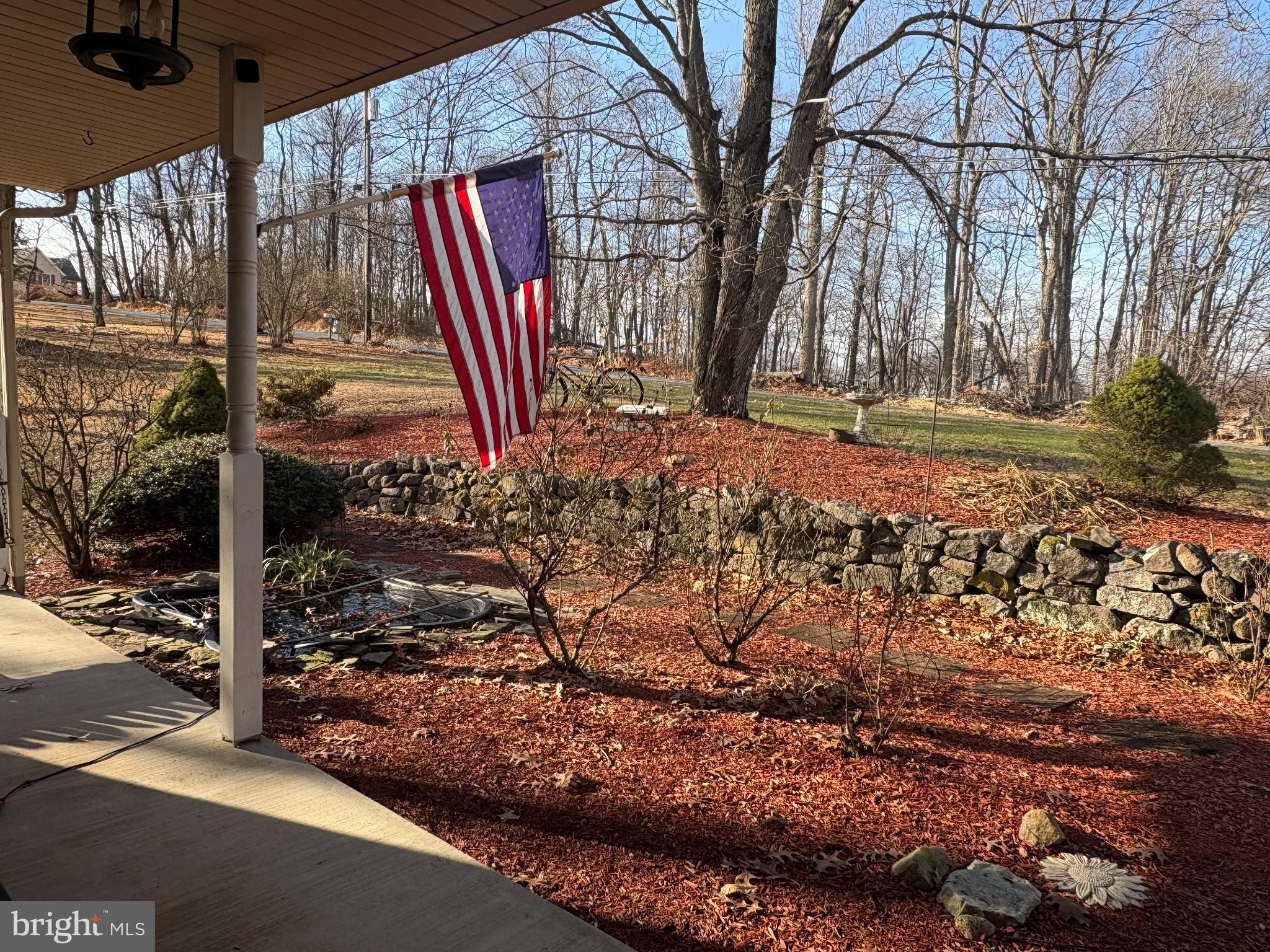 258 Beaver Road Birdsboro, PA 19508 - Photo 4 of 59 Charming landscape with a flag's embrace.