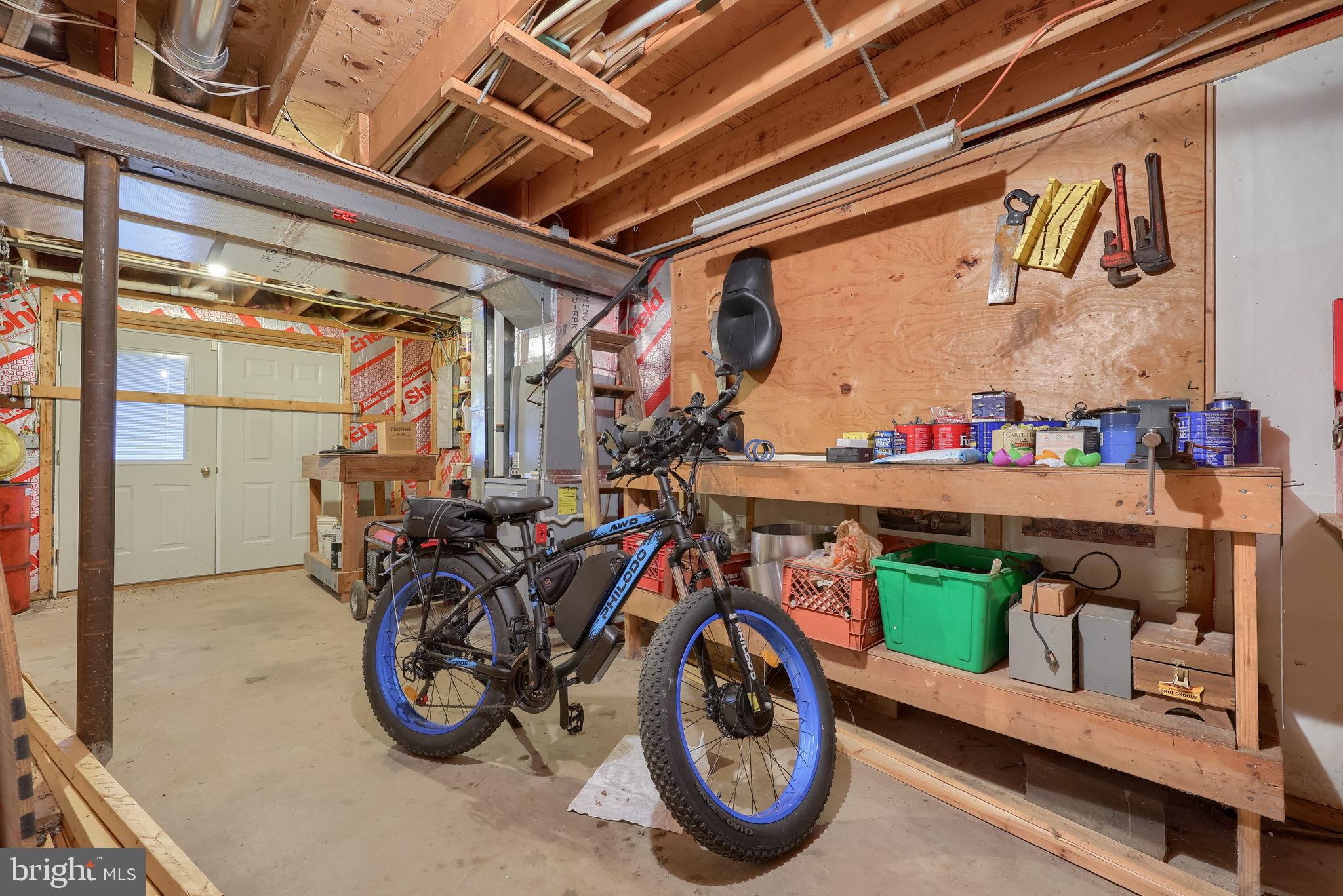 258 Beaver Road Birdsboro, PA 19508 - Photo 41 of 59 Spacious garage with bike and tools.