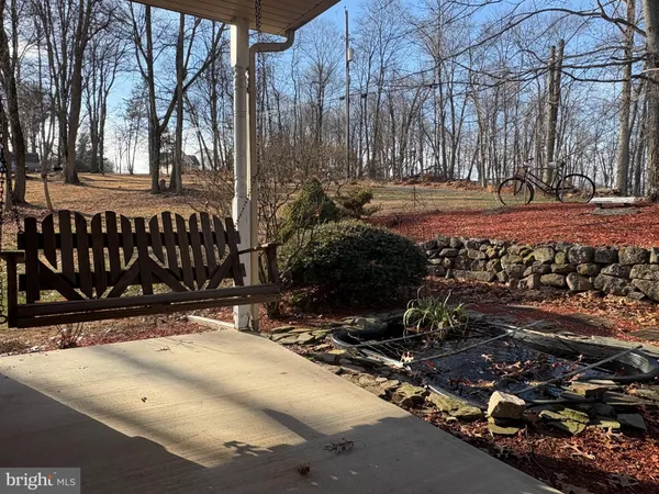 a view of outdoor space with wooden fence