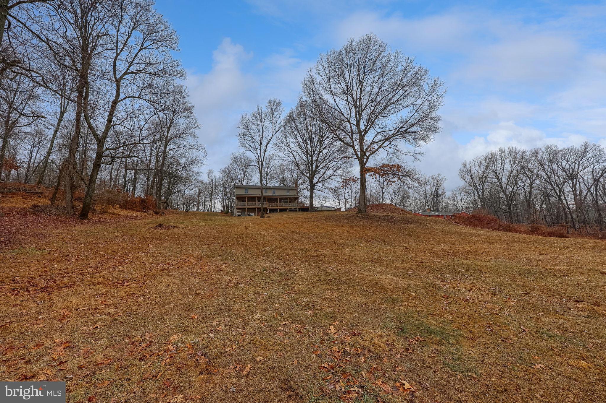 258 Beaver Road Birdsboro, PA 19508 - Photo 52 of 59 Serene landscape with a rustic retreat.