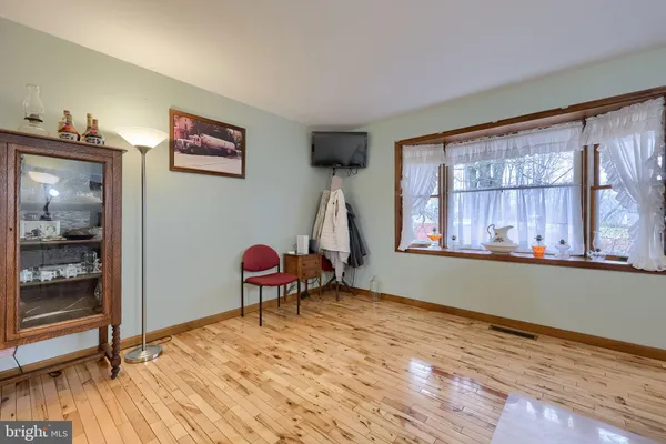 a room with furniture and a window