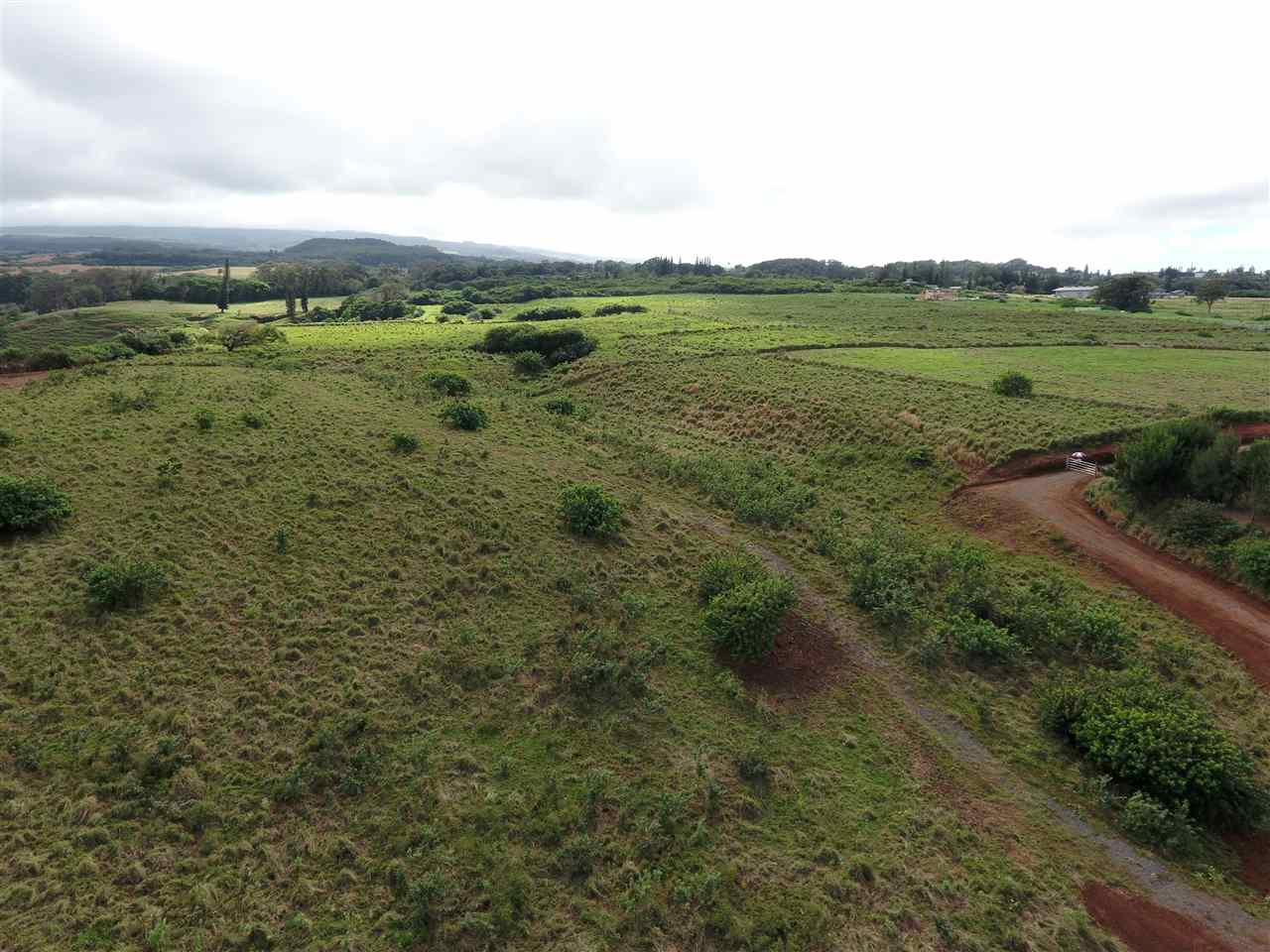 1855 Kauhikoa Road, Unit 222A Haiku, HI 96708 - Photo 9 of 16 a view of an ocean and a mountain