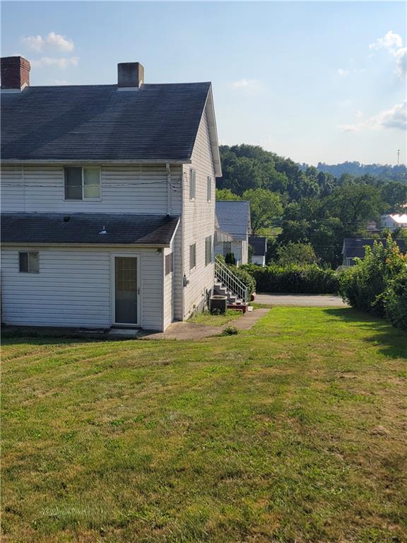 141 Grant Street Star Junction, PA 15482 - Photo 19 of 22 a view of a house with a yard
