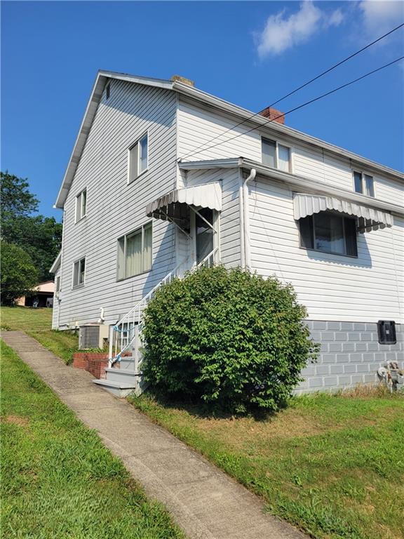 141 Grant Street Star Junction, PA 15482 - Photo 21 of 22 a front view of a house with a yard