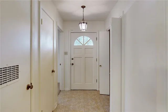 a view of a room with cabinet cabinets and a kitchen