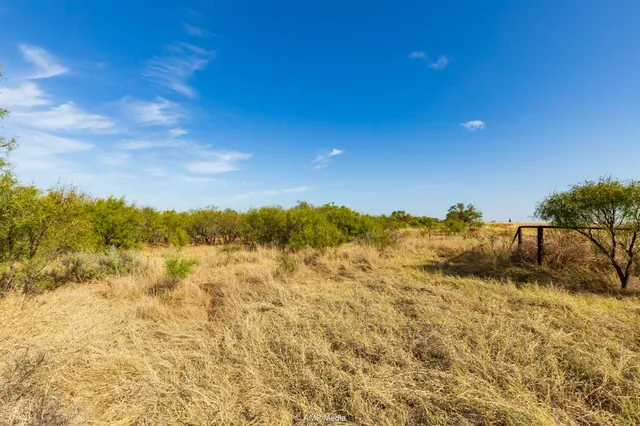 a view of a lake with a beach