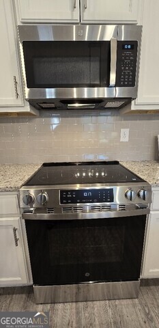 3405 Ripple Loop, Unit 127 Atlanta, GA 30349 - Photo 10 of 26 a close view of stove