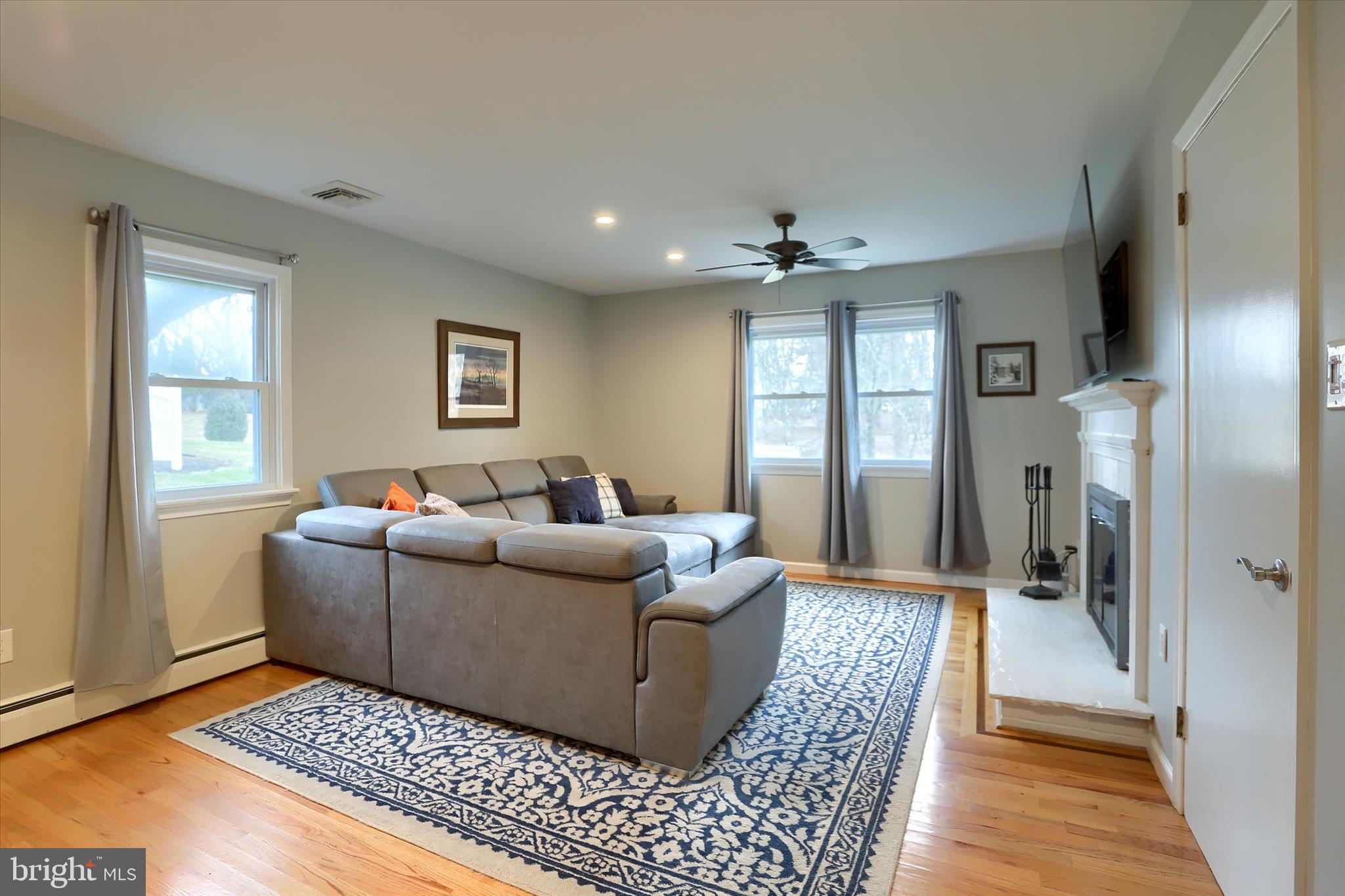 1288 Copeland School Road West Chester, PA 19380 - Photo 12 of 36 a living room with furniture and a rug