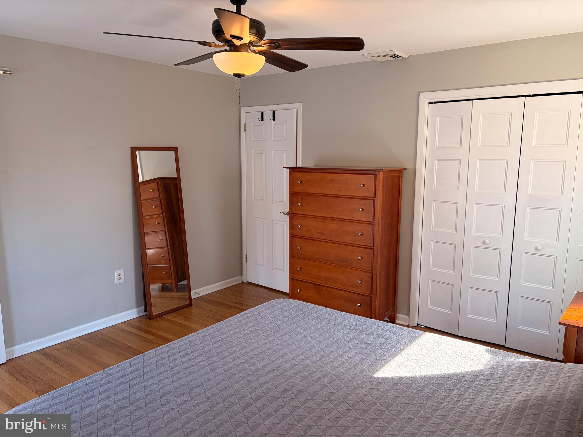 1288 Copeland School Road West Chester, PA 19380 - Photo 19 of 36 a bedroom with a bed and a ceiling fan
