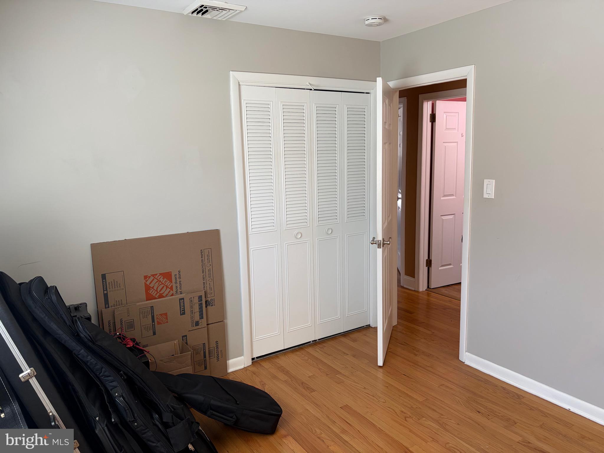 1288 Copeland School Road West Chester, PA 19380 - Photo 24 of 36 a view of a hallway with wooden floor and closet