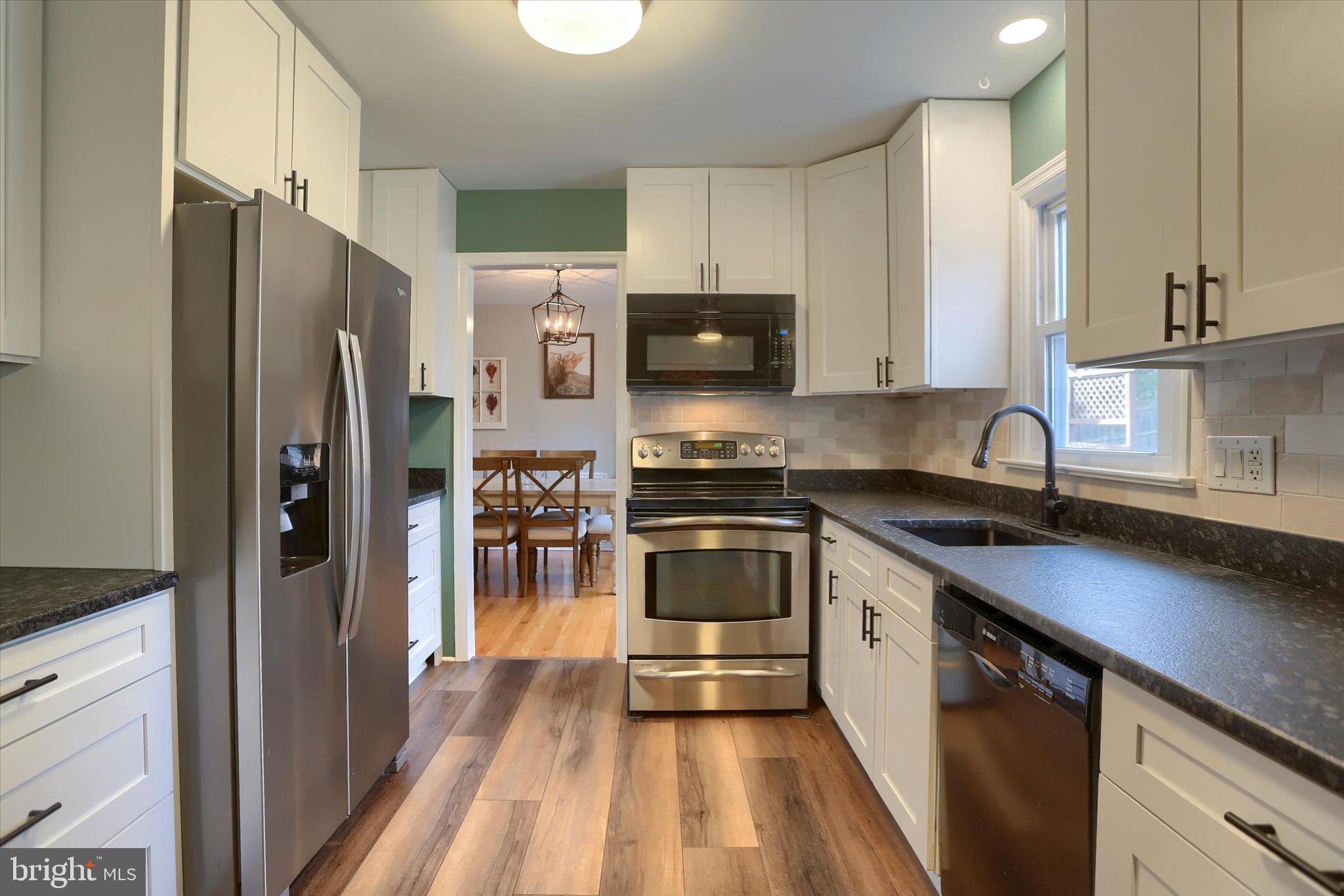 1288 Copeland School Road West Chester, PA 19380 - Photo 6 of 36 a kitchen with stainless steel appliances a refrigerator sink and microwave