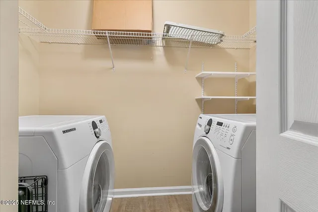 a utility room with dryer and washer