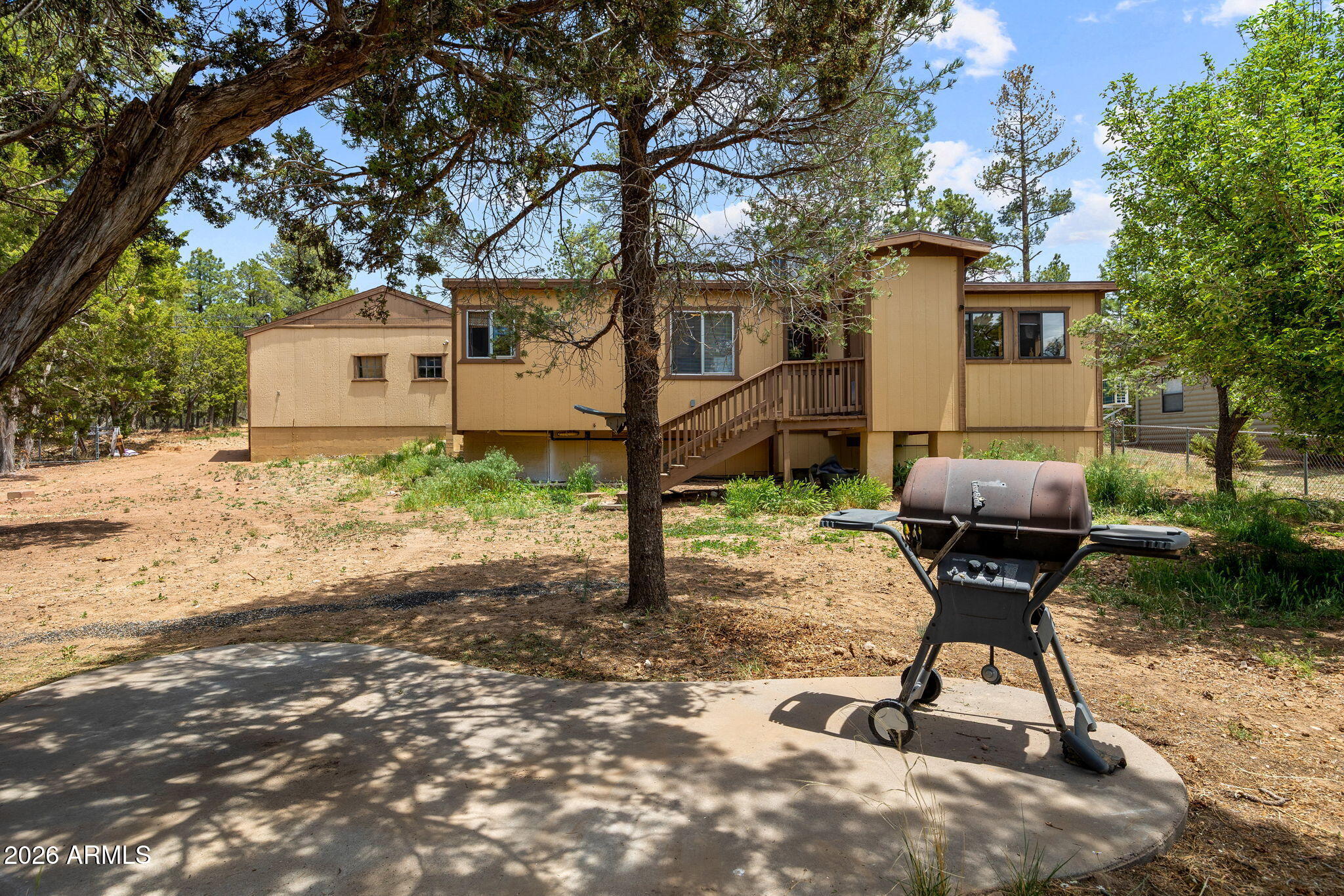 3384 Turkey Run Overgaard, AZ 85933 - Photo 29 of 37 a view of a house with backyard