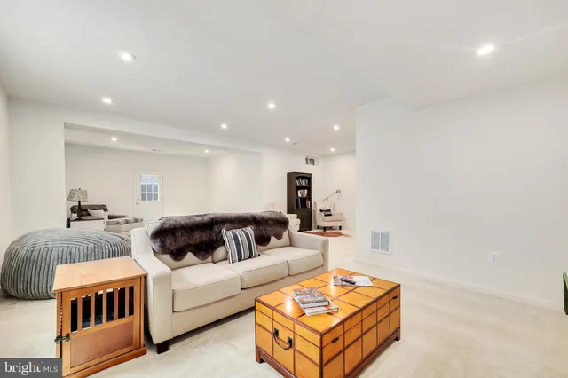 a bedroom with furniture and a couch