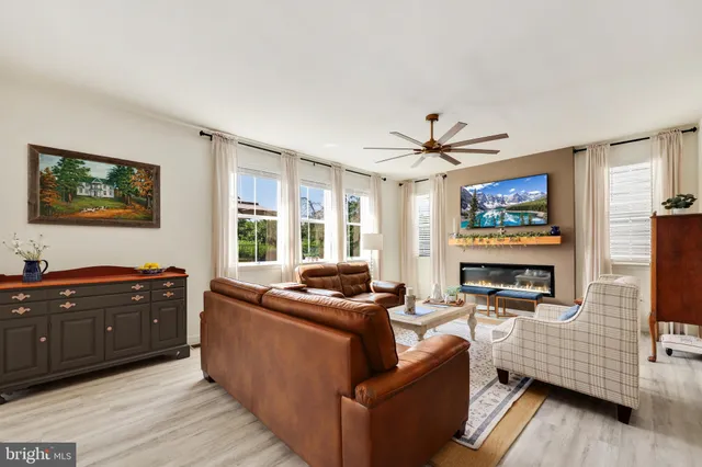 a kitchen with a table and chairs in it