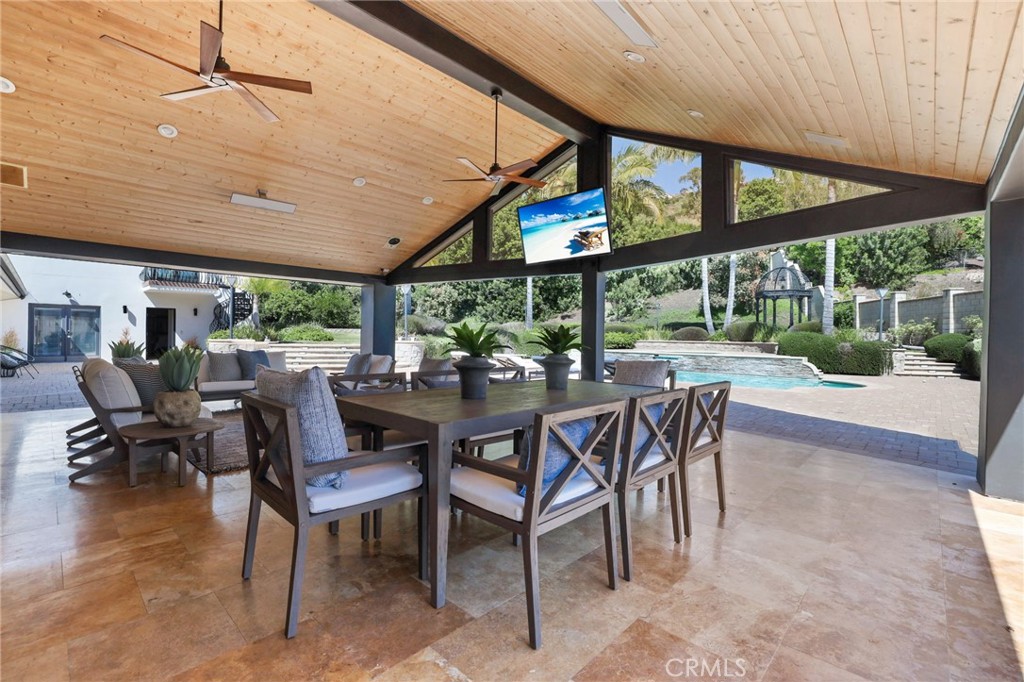 10372 South Crawford Canyon Road Santa Ana, CA 92705 - Photo 14 of 75 a view of a patio with a table and chairs