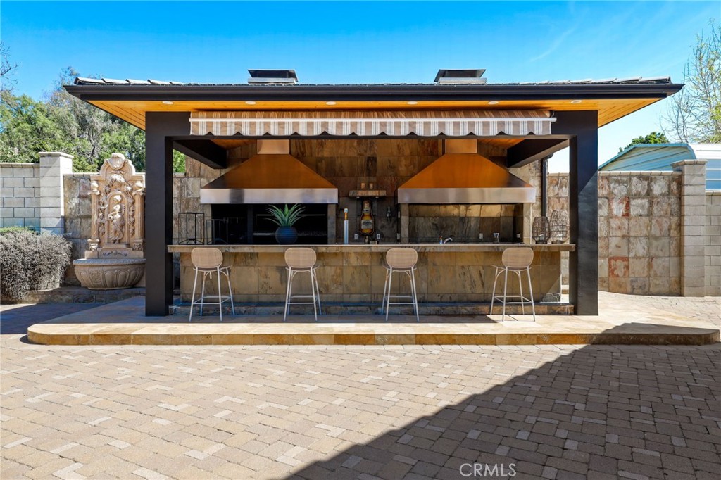 10372 South Crawford Canyon Road Santa Ana, CA 92705 - Photo 22 of 75 a view of pool with outdoor seating
