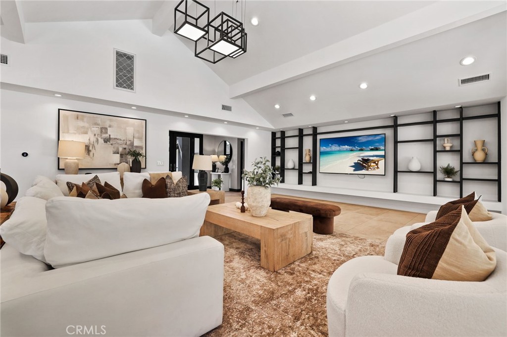 10372 South Crawford Canyon Road Santa Ana, CA 92705 - Photo 31 of 75 a living room with furniture and a large window