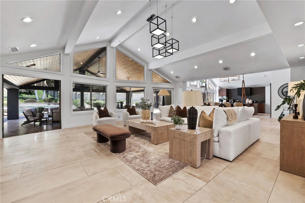 10372 South Crawford Canyon Road Santa Ana, CA 92705 - Photo 33 of 75 a living room with lots of furniture and view of kitchen