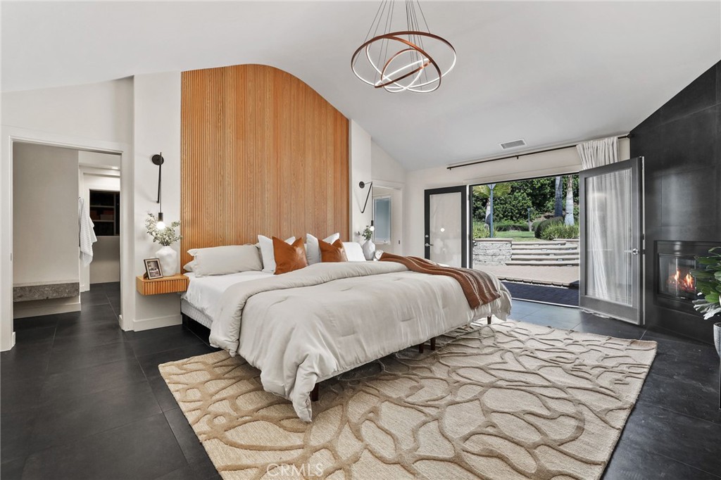 10372 South Crawford Canyon Road Santa Ana, CA 92705 - Photo 39 of 75 a bedroom with bed and a window