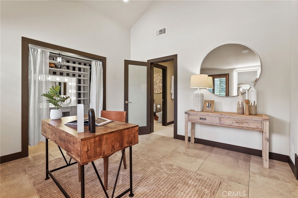 10372 South Crawford Canyon Road Santa Ana, CA 92705 - Photo 49 of 75 a living room with furniture and a table