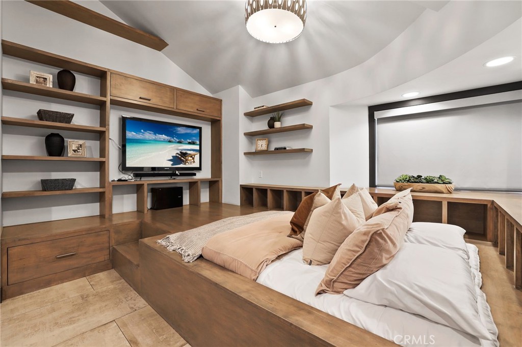 10372 South Crawford Canyon Road Santa Ana, CA 92705 - Photo 56 of 75 a living room with furniture and a flat screen tv