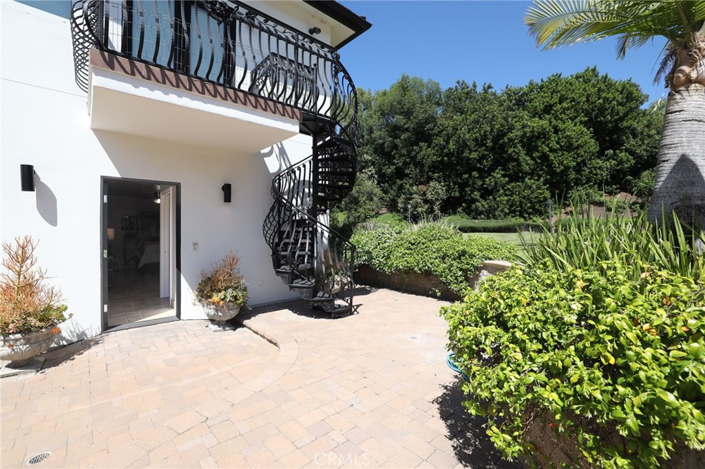 10372 South Crawford Canyon Road Santa Ana, CA 92705 - Photo 59 of 75 a view of a house with a yard