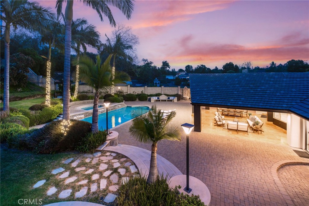 10372 South Crawford Canyon Road Santa Ana, CA 92705 - Photo 9 of 75 a view of a swimming pool and lounge chair