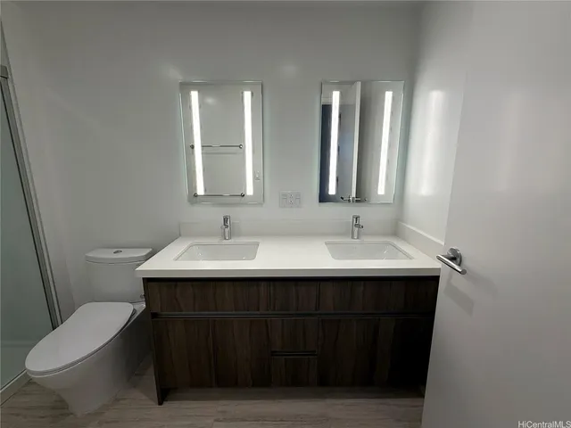 a bathroom with a sink and a toilet