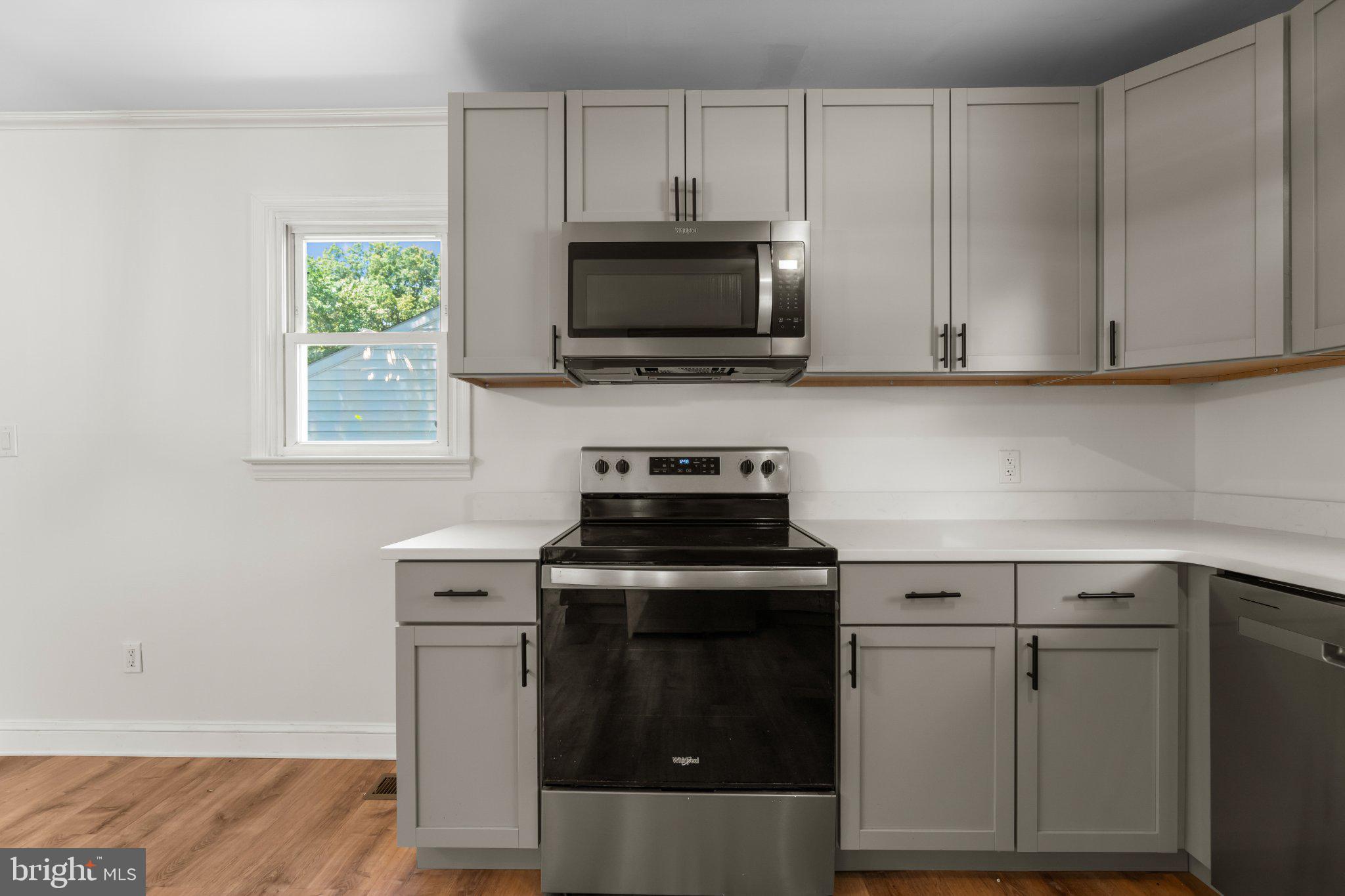 12 Oak Street Cambridge, MD 21613 - Photo 9 of 30 Modern kitchen with sleek finishes.