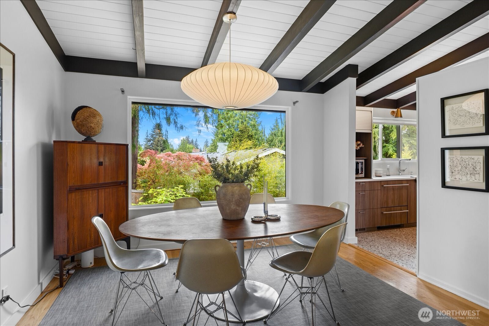 18722 84th Avenue West Edmonds, WA 98026 - Photo 16 of 40 a dining room with furniture and wooden floor