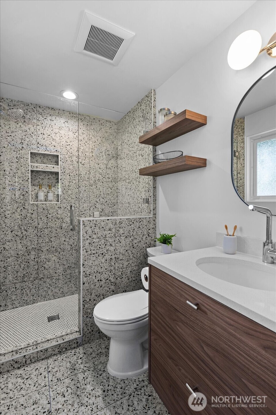 18722 84th Avenue West Edmonds, WA 98026 - Photo 20 of 40 a bathroom with a sink a toilet and shower