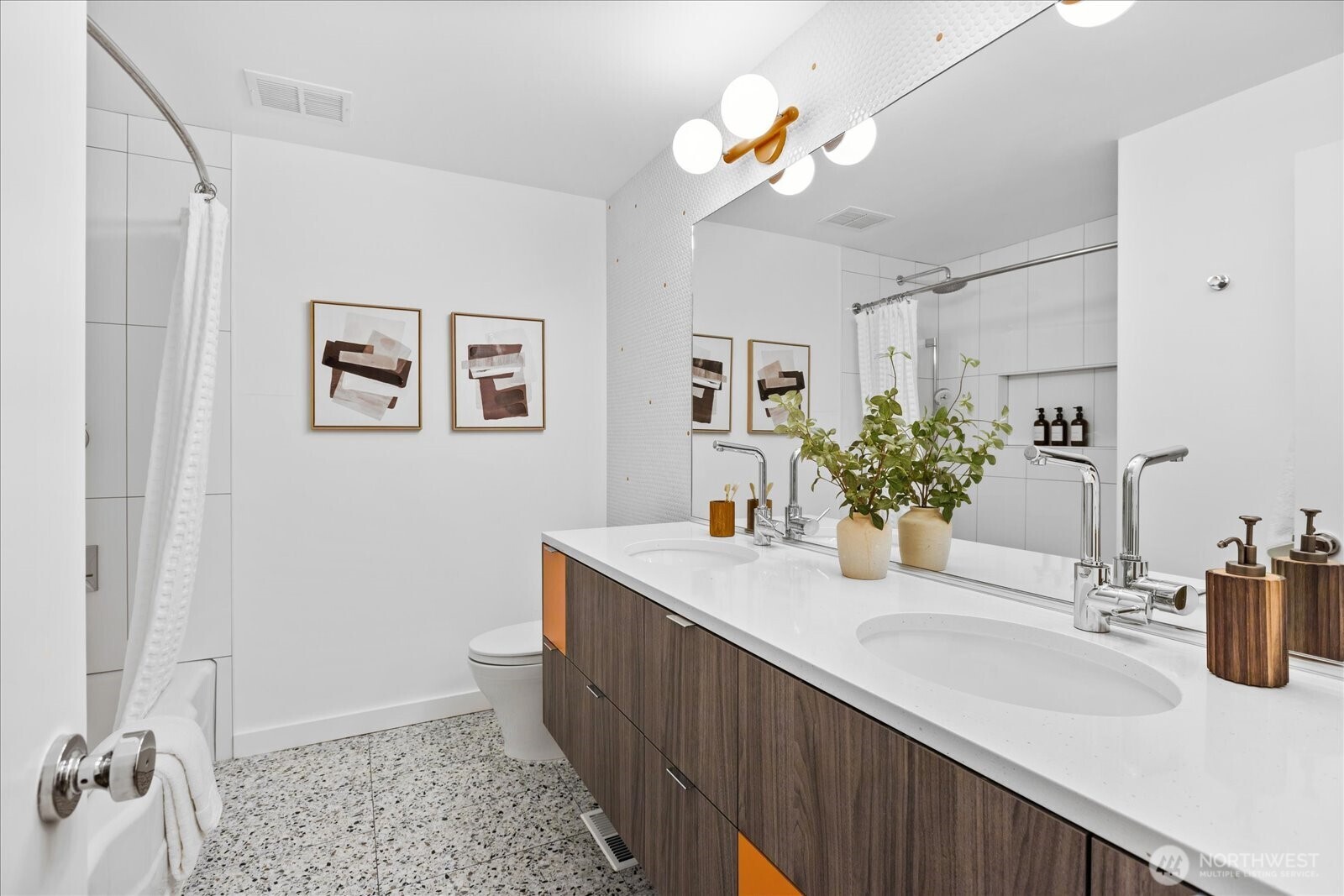18722 84th Avenue West Edmonds, WA 98026 - Photo 23 of 40 a bathroom with a sink a toilet and mirror