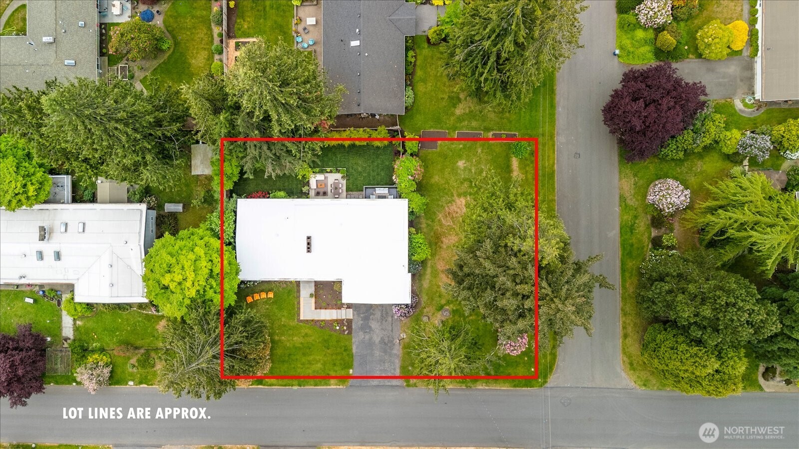 18722 84th Avenue West Edmonds, WA 98026 - Photo 36 of 40 aerial view of a house with a garden and plants